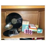 Contents of Shelf - Camera Accessories / CDs /