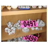 Contents of shelf - Assorted Mini Tea Sets