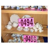 Contents of shelf - Assorted Mini Tea Sets