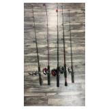 Five fishing poles with reels, including Zebco