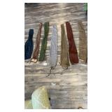 Seven gun sleeves, long ones approximately 53