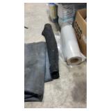 Large roll of clear, plastic, landscape, fabric,