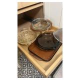 Glass, baking dishes, cookware covered