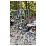 Two firewood carriers on pallets