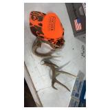 Deer antlers in camouflage hat