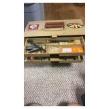 tacklebox, full of gun cleaning supplies