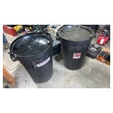 2 like new trash cans with lids 32 gallon