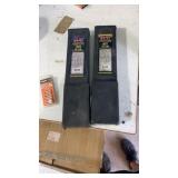 Two almost full boxes of 1/8 inch welding rods,