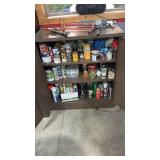 Metal cabinet full of glue enamel, paint, caulk