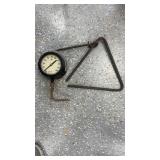 Iron dinner, bill with pressure gauge and battery
