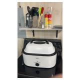 Large roaster with can opener and kitchen