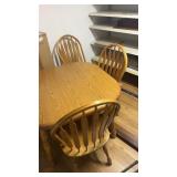 Table with four chairs and extra leafI
