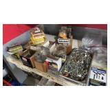 Large assortment of nuts, bolts screws, staples