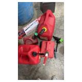 Gas cans and transfer pump along with funnels and