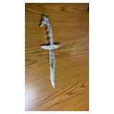 Knife and spoon. Knife was brought back from