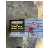 Electric chainsaw sharpener, new in the box