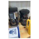 2 coffee, makers filters, cups, kitchen supplies,