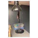 Bench mount light and soldering glue sticks