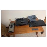 BHS player, DVD player and a VHS rewinder