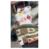 2 quilts. One is in poor condition.