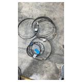 Several assorted band saw blades, some new some