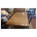 Table and six chairs includes two extra leaves