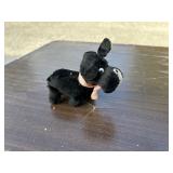 Mechanical Scotty dog. Does not run. Has a Made