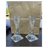 Two elegant glass candlestick holders