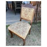 Embroidered armless chair