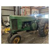 John Deere 70,  gas, needs a carburetor, stuck in