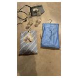 Vintage clothes, pens, and two milk bottles along