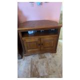 Oak stand with two doors. Small items not