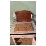 Two pig cutting boards