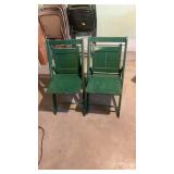 Two vintage wooden folding chairs