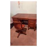 Hardwood riding desk with rolling chair