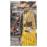 Several hand tools, including screwdrivers,