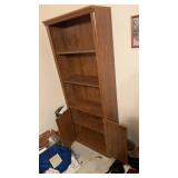 Bookshelf, approximately 83 inches tall and 28