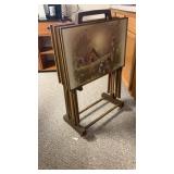 Two vintage TV trays with roll around cart.