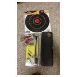 Gun, cleaning equipment, and paper targets