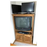 Tv stand including VCR and DVD player. Along with