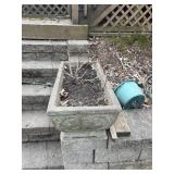 Six concrete planters