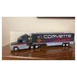 White GMC cab with drop bed trailer. 1/64 scale