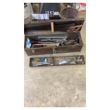 Metal toolbox with hand saws, screwdrivers,