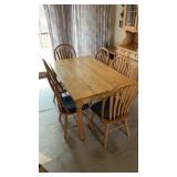 Dining room table with six matching chairs