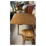 Wooden table with two matching chairs