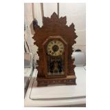 Wood carved mantle clock