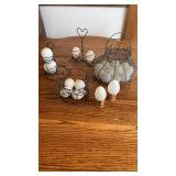 Metal egg baskets with glass, eggs, and egg