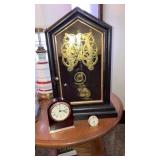 Three clocks. Howard Miller. Caravelle