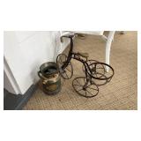Small bicycle plant holder with tin flower pot