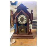 Wood carved mantle clock